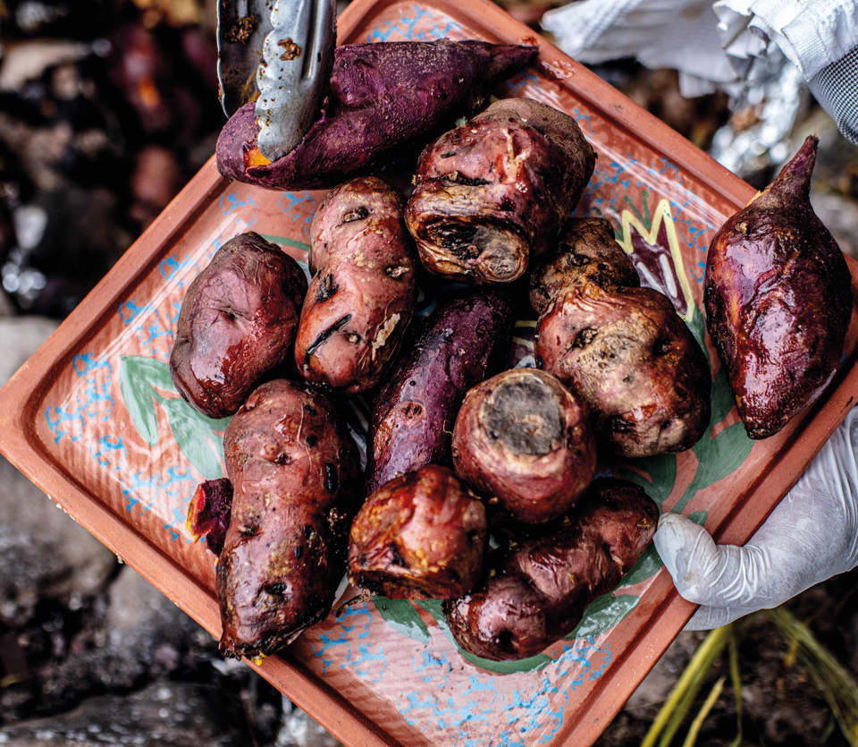 A plate of delicious looking roasted vegetables cooked in the traditional Inca Pachamanca style